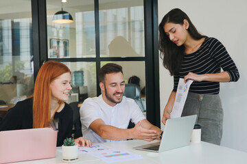 Business discussions. Shot of businesswomen brainstorming in an office