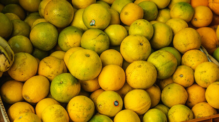 Oranges in a fruit basket at an open market in Brazil