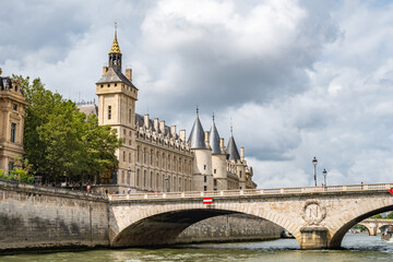 Pont au Change bridge and The Conciergerie from the Seine, in Paris, France