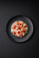 Delicious boiled rice with peppers, peas, asparagus beans and carrots