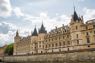 Fototapeta na wymiar The Conciergerie from the Seine, in Paris, France