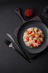Delicious boiled rice with peppers, peas, asparagus beans and carrots
