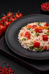 Delicious boiled rice with peppers, peas, asparagus beans and carrots