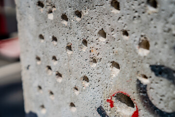 Drilled holes in concrete close up