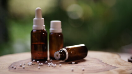 Obraz na płótnie Canvas homeopathy - homeopathic medicine bottles