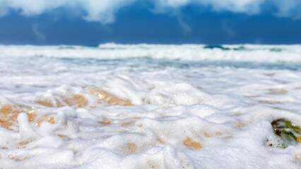 white sea foam of the stormy sea