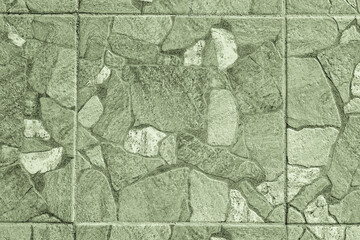 square ceramic tiles for indoor or outdoor flooring. gray-green tile with stone texture.