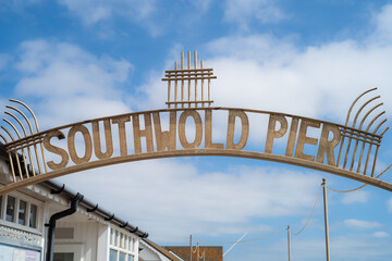 The sign over the entrance to Southwold Pier, Suffolk, uk - 606179280