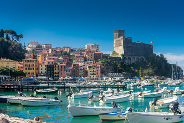 Fototapeta na wymiar Lerici, Italy, 13 April 2022: View of the seaside colorful town of Lerici in Liguria