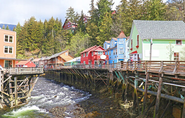 Fototapeta na wymiar Ketchikan, Alaska. Colorful Historic Creek Street boardwalk and shops, built on Stilts