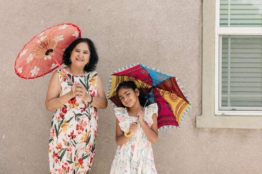South Asian grandparent and granddaughter together
