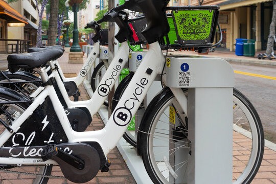 San Antonio, Texas, USA – May 9, 2023: BCycle electric bicycles sharing rental station in Downtown San Antonio, Texas, after a light rain.