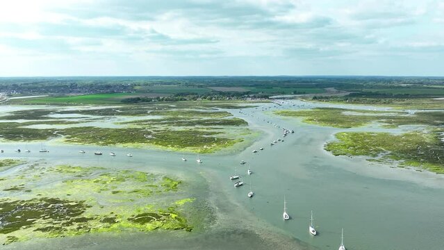 Hurst Point near Milford on Sea. Swamp and yachts. Cinematic drone flight