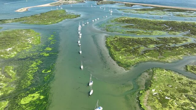 Hurst Point near Milford on Sea. Swamp and yachts. Cinematic drone flight