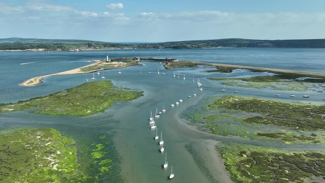 Hurst Point near Milford on Sea. Swamp and yachts. Cinematic drone flight