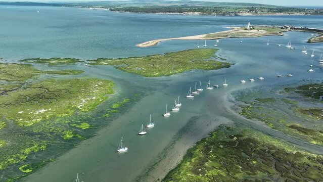 Hurst Point near Milford on Sea. Swamp and yachts. Cinematic drone flight