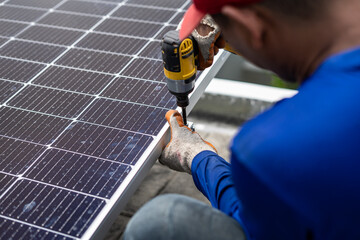 Technician installing solar panels on rails