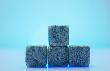 stone cubes on blue background for podium background