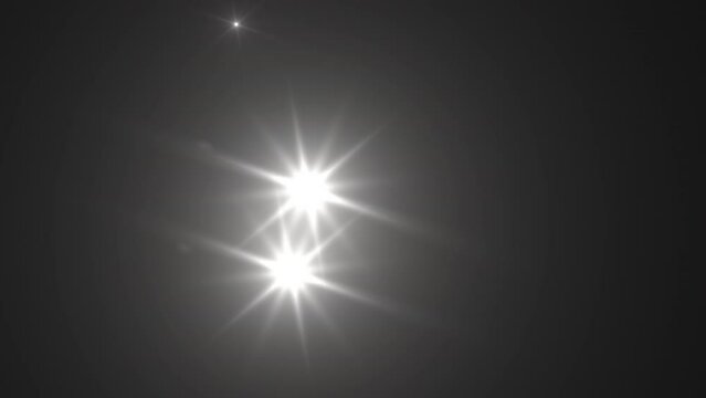 Photographer camera flashes. Random bright blinking lights. Flashing lens flares. Seamless looping.