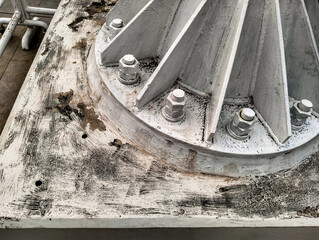 white bridge fixing iron with nuts and bolts