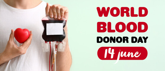 Banner for World Blood Donor Day with man and blood pack