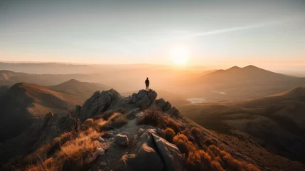 Foto auf Alu-Dibond A person standing on top of a mountain at sunset. AI generative image. © starush