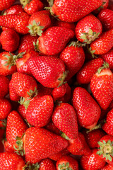 Texture of fresh strawberries as background
