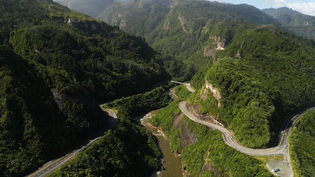 Drone view of westcoast of New Zealand coastal highways. Nine mile lookout. Scenic winding road.