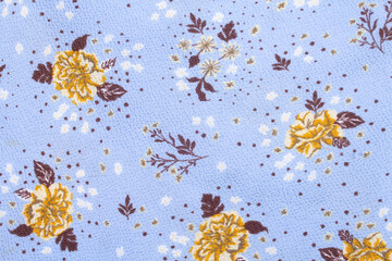 Background light blue dress fabric with floral motifs