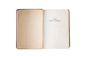 Old Holy Bible, open. Yellow stained pages. Top view, transparent background.