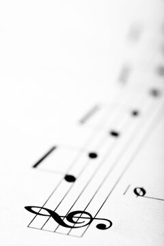 detail of a music sheet with the g clef
