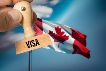 Flag of Canada and stamp Visa