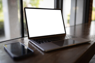 Laptop with blank screen on table. Workspace background new project on laptop computer with blank copy space screen for your advertising text message