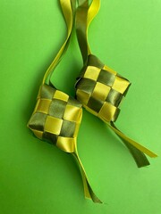green ribbon ketupat