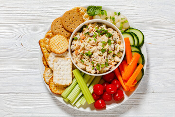 salmon salad with fresh veggies and crackers