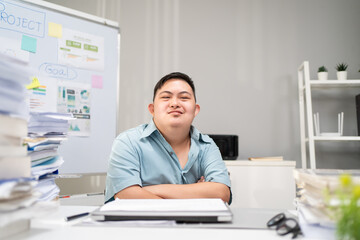 Fototapeta na wymiar Portrait of Asian young businessman patient work in office workplace. 