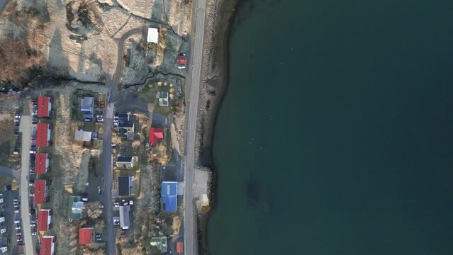 The border between two opposite lifestyles. Iceland in spring, drone shot