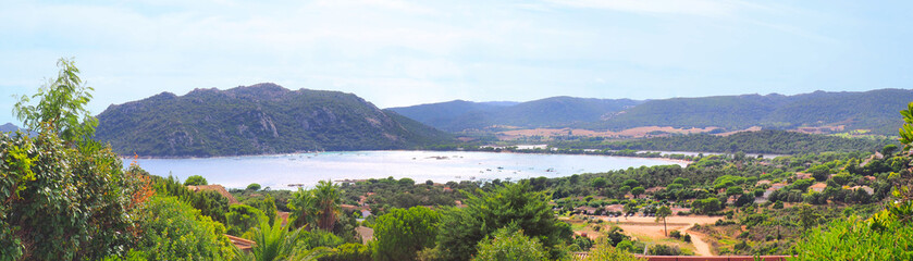 Fototapeta na wymiar Panoramic view of the bay and Saint Cyprien beach near Porto-Vecchio, a famous port town dominated by its Genoese citadel, in Corsica (nicknamed the Island of Beauty)