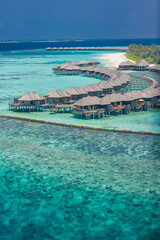 Maldives paradise island. Tropical aerial landscape, seascape, water villas bungalows with amazing sea and lagoon beach, tropical nature wave breaker. Exotic tourism destination banner summer vacation
