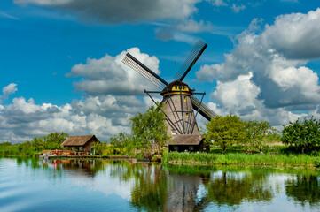 Fototapeta premium Windmills at the Unesco heritage site in Kinderdijk in Holland