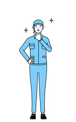 自信家のポーズを取る帽子と作業着姿の女性