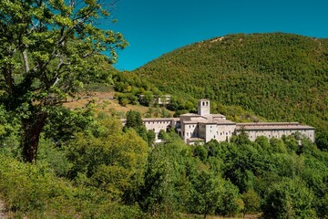 Fototapeta na wymiar View of the Fonte Avellana Monastery in the Apennines mountains of the Marche region of Italy