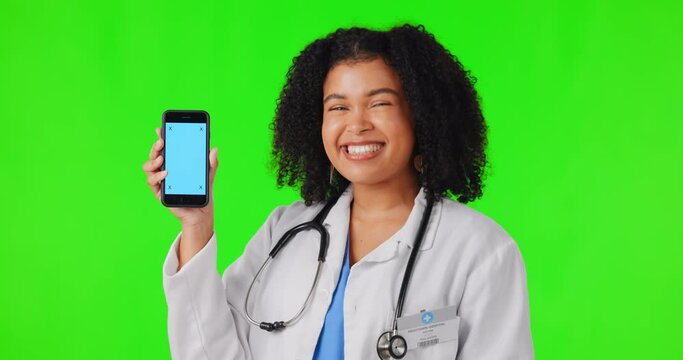 Face, woman and doctor with phone on green screen in studio isolated on a background. Smartphone, mockup portrait and African medical professional with marketing, happy space and tracking markers.