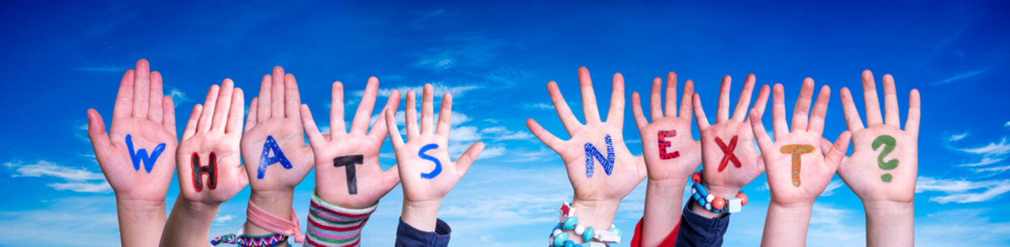 Children Hands Building Word Whats Next. Blue Sky