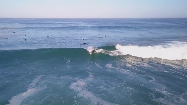 Aerial drone cinematic sunrise early morning unknown surfer wave barreled Hoosegor Capbreton France Europe Bay of Biscay WSL Quiksilver Pro central Peronze sunny midday left  movement