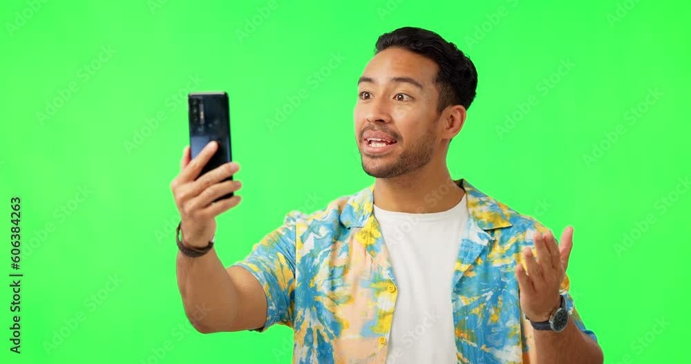 Wall mural Hello, video call and man in green screen studio excited, smile and happy on mockup background. Hand, wave and asian guy travel influencer live streaming, content creation or blog to online followers