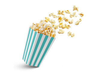 Popcorn flying out of turquoise white striped paper box isolated on white, transparent background, PNG, with copy space. Splash, levitation of popcorn grains. - obrazy, fototapety, plakaty