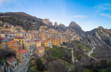 Fototapeta na wymiar Castelmezzano (Italy) - A view of little old village, dug into the rock in the natural park of the Dolomiti Lucane, Basilicata region, famous also for the alpinistic ways.