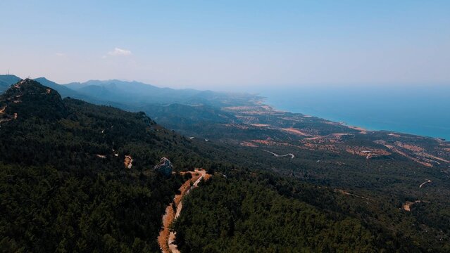 Aerial view of Esentepe, Kaplica, Bahceli villages in Kyrenia in North Cyprus on sunny day with clear sky.