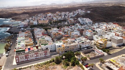 Drone cityscape view of La Jaca town near the sea in Tenerife, Canary Islands, Spain